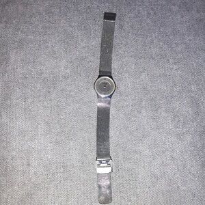 Skagen Mesh band analogue Watch silver tone with gold tone numbers